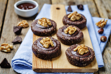 Raw vegan chocolate dates hazelnut cookies with chocolate frosti