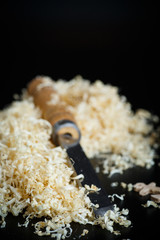 Woodworking tools. Chisel with sawdust .