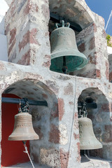 Obraz premium Church bell tower in Oia on Santorini Island.