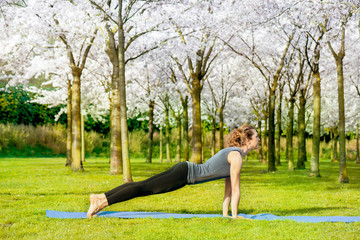 Slim woman stretching