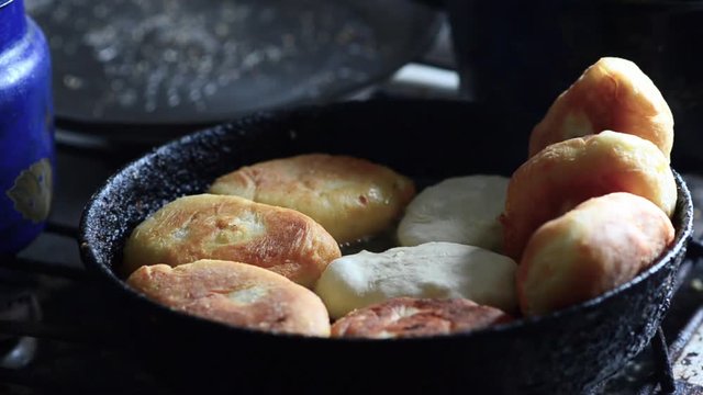 Fried in the oil cruller pie on the pan