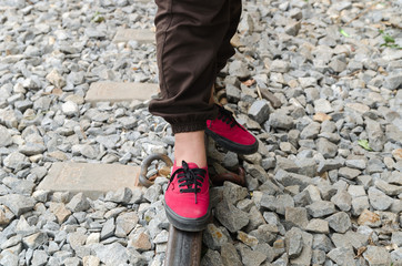 human stand on the rails