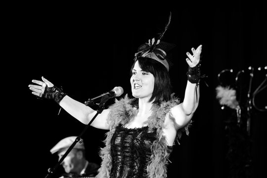 Christel Kern singing chanson. Portrait of french actress. Scene