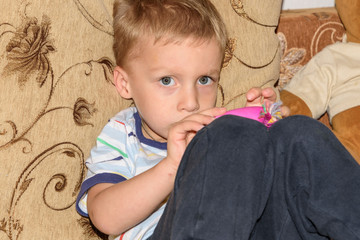 Naklejka premium child boy playing toy