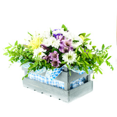 box composition with fresh flowers on a white background isolate