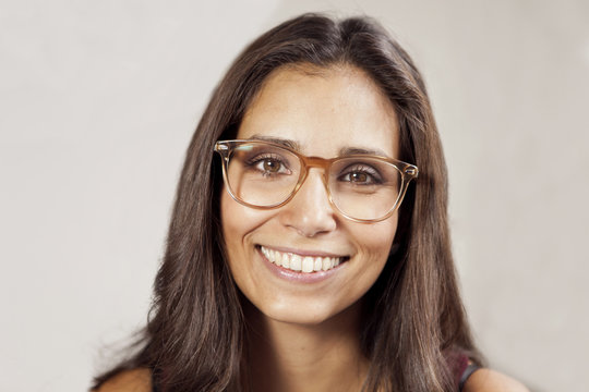 Portrait of smiling woman with glasses