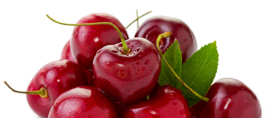 Red Cherries isolated on white.