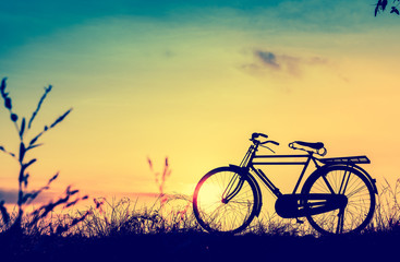 Fototapeta na wymiar beautiful landscape image with Silhouette Bicycle at sunset in