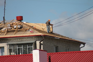 repairing the roof of the house