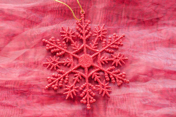 Single red glitter snowflake