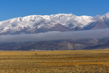 mountain steppe snow clouds