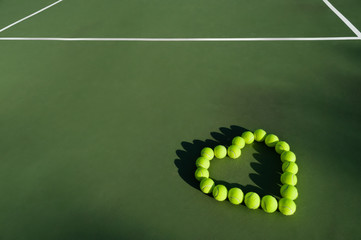 Tennis balls in shape of heart