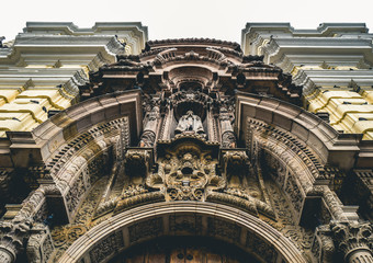 Fototapeta na wymiar looking up on the entry archway to a church