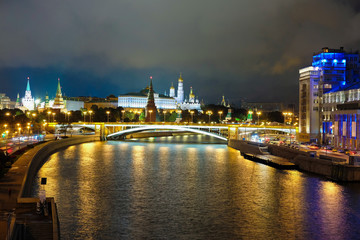 Fototapeta na wymiar Moscow, Russia - September, 17, 2016: night landscape with the image of the Moskow (Moskva) River embankment and the Kremlin