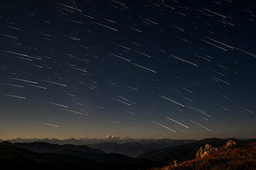 mountains star tracks sky