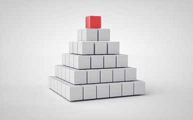 Pyramid made of gray cubes with different red cube on top. 