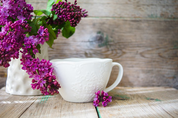 Lilac flowers in a rustic interior