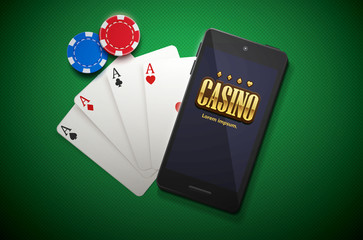 casino chips and mobile isolated on green background