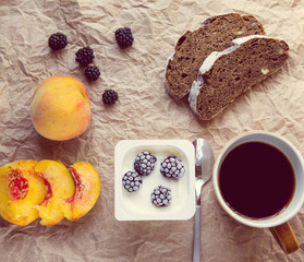 Fresh fruits, yogurt and coffee for breakfast