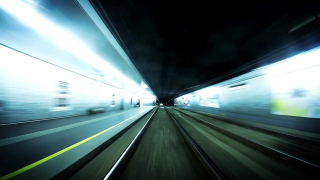 4K blue toned Footage of an underground tram on its route in Vienna