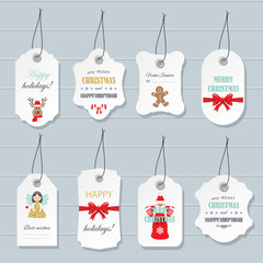 Christmas and Happy New Year labels and badges templates set with cute cartoon characters and glitter elements.