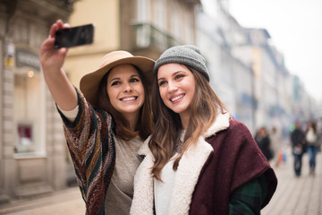 Women taking selfies