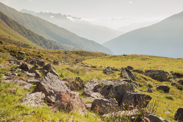 Great view with stones on mountains and valley in Ponte di Legno