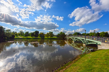 View of the Western arched bridge over the pond in the Park Tsaritsino. Moscow, Russia.