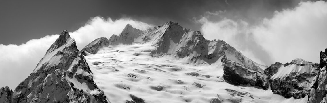 Fototapeta Black and white panorama of winter mountains