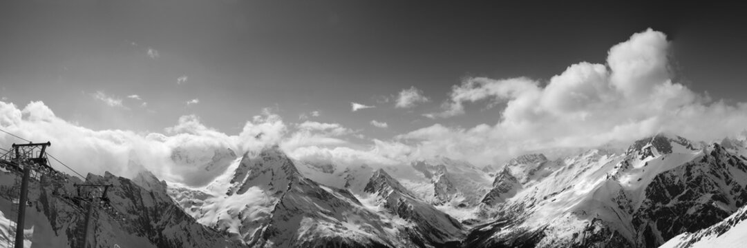 Black and white panoramic view from ski resort in nice sun day