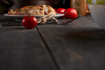 fried chicken and tomatoes on a  table