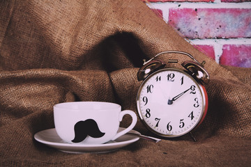 Coffee cup with a black hipster mustache  Vintage Retro Filter.