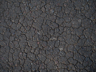 old cracked asphalt