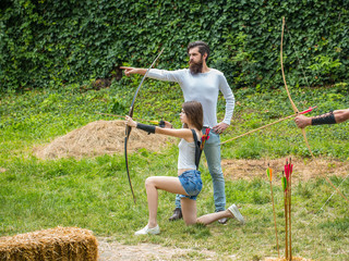Couple shoots out of the bow
