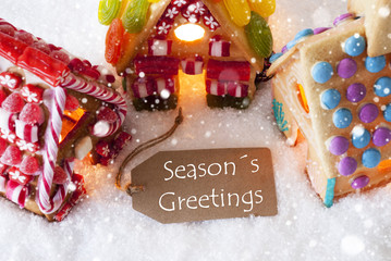 Colorful Gingerbread House, Snowflakes, Text Seasons Greetings