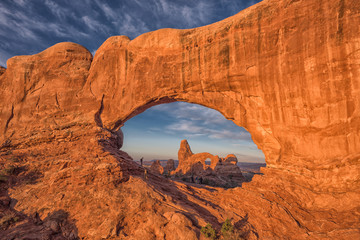 Turret Arch through North Window at sunrise at Arches National P © dianarobinson