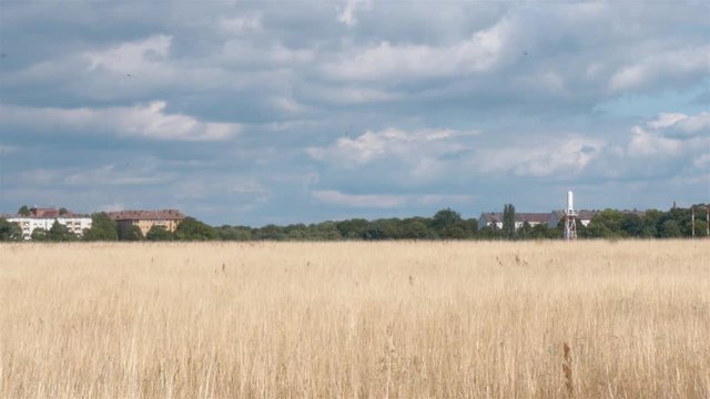 Real Time locked down shot of Tempelhofer Feld in Berlin, Germany. Tempelhofer Feld is former airport of Berlin-Tempelhof which is currently a public park.