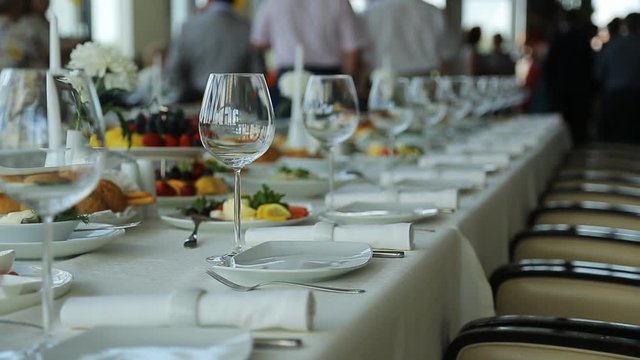 Close up view of served banquet table prepared for celebration.
