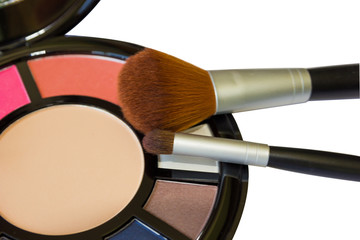 Palette for make-up and brushes close-up