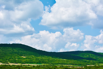Fototapeta premium Hills under the Cloudy Sky