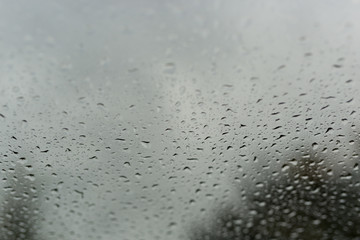 Drops of rain on glass , rain drops on clear window