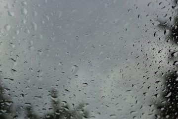 Drops of rain on glass , rain drops on clear window