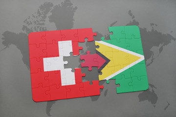 puzzle with the national flag of switzerland and guyana on a world map background.