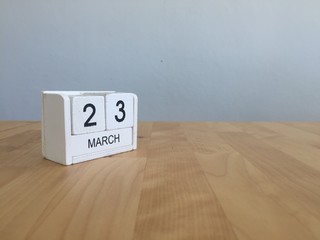 March 23rd. March 23 white wooden calendar on vintage wood abstr