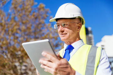 Engineer builder at construction site