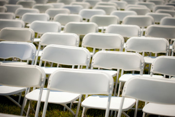 Fototapeta premium Rows of Empty White chairs