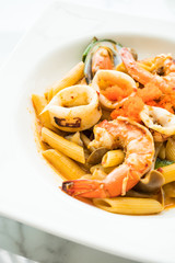 Penne seafood tom yum pasta