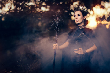 Evil Queen Holding Scepter in Misty Forest