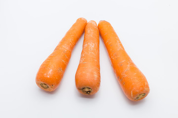 Fresh carrots isolated on white background