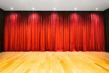wood floor with scarlet curtain